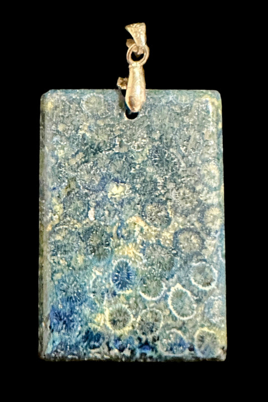 An Ocean of Time Pendant.  Designed and produced by AstroCreations, makers of unique of Zodiac jewelry.