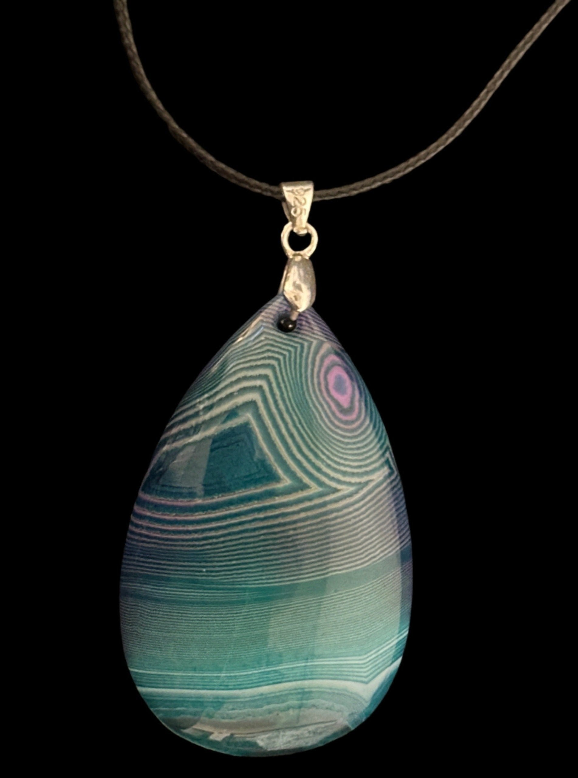 Aquarius Pendant, designed by AstroCreations makers of unique Zodiac jewelry. 