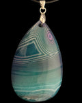 Aquarius Pendant, designed by AstroCreations maker of unique Zodiac jewelry. 