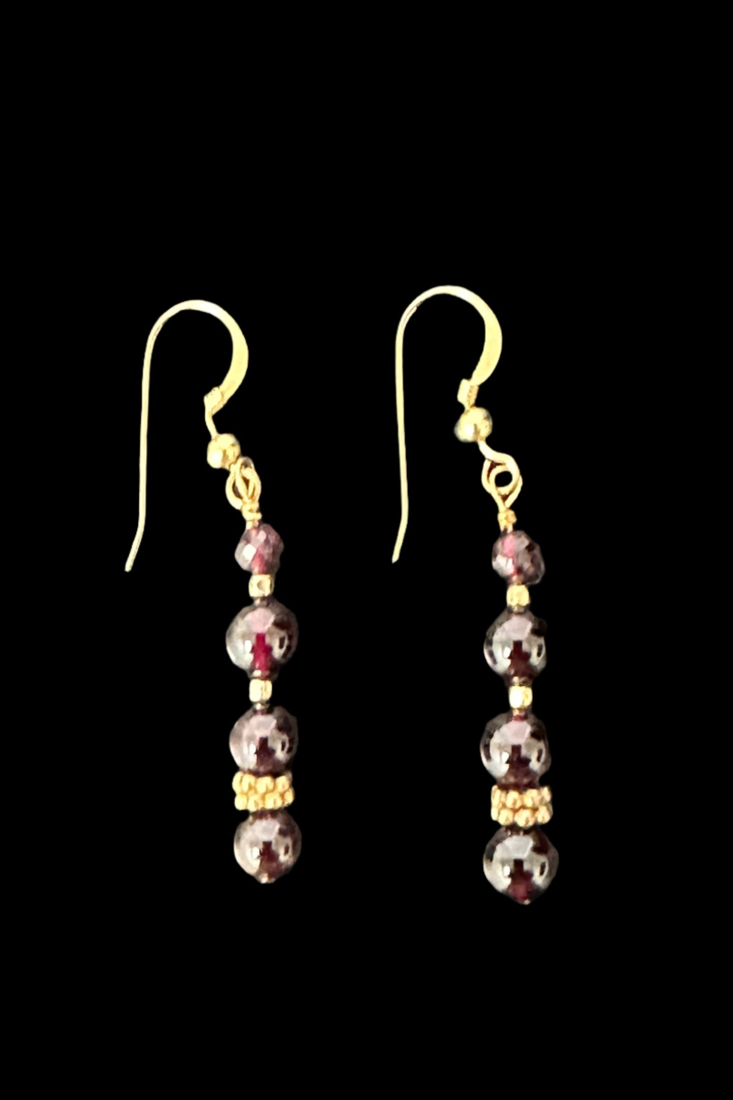 Capricorn Earrings, designed and created with Garnett gemstones, produced by AstroCreations, makers of  unique Zodiac jewelry.