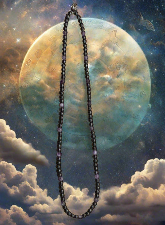A Capricorn Necklace designed with gemstones. The size of the necklace:  16 inches (4 mm). A beautiful one-of-a-kind necklace created by AstroCreations, makers of Zodiac jewelry.
