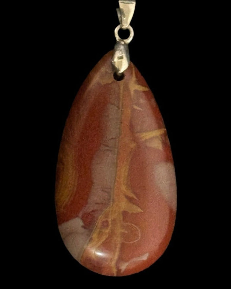 'Golden Moments,' a pendant designed and produced by AstroCreations, makers of unique Zodiac jewelry.