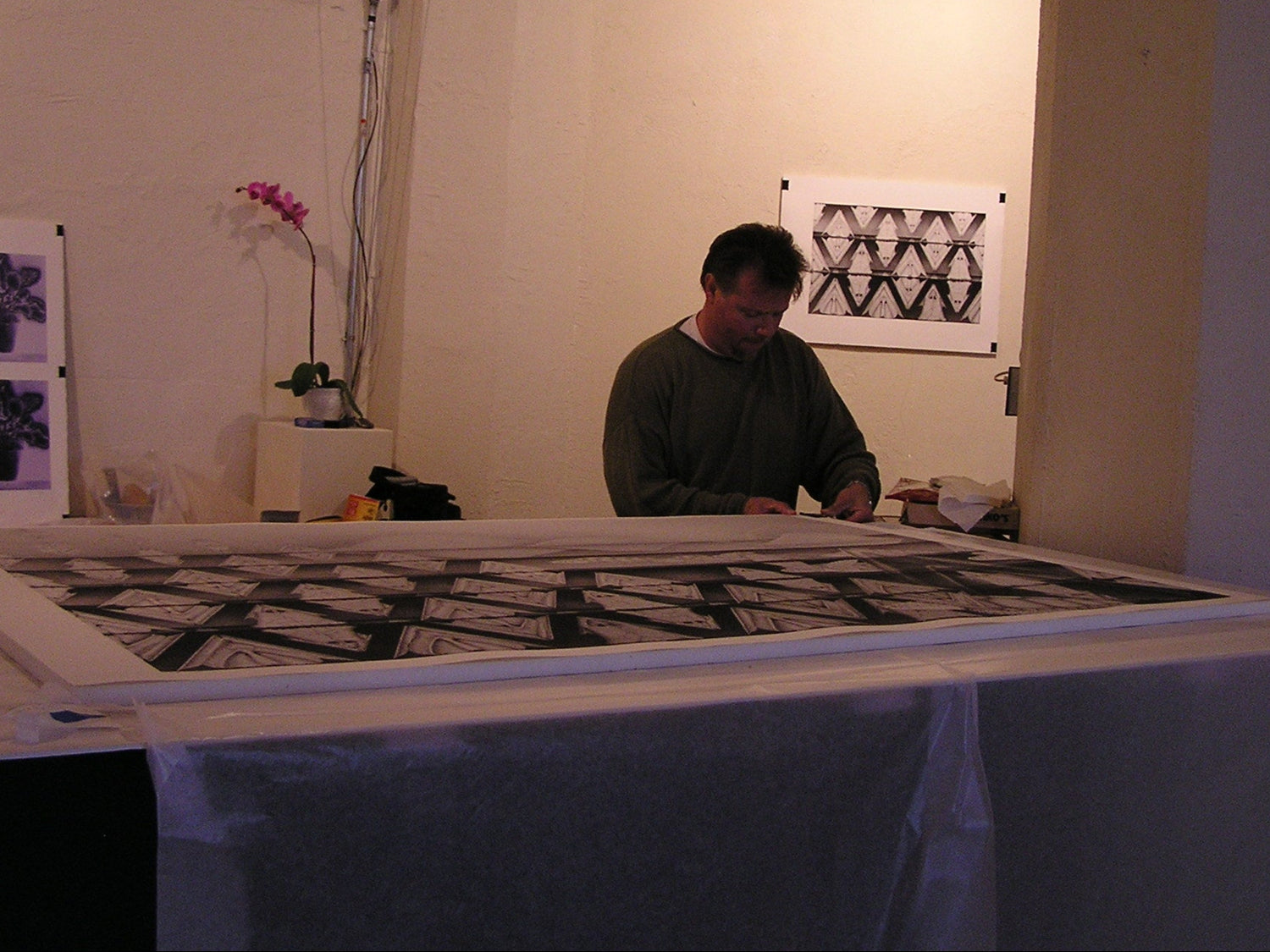 James M. Cloer preparing an exhibit at The Melting Point Gallery, San Francisco, CA