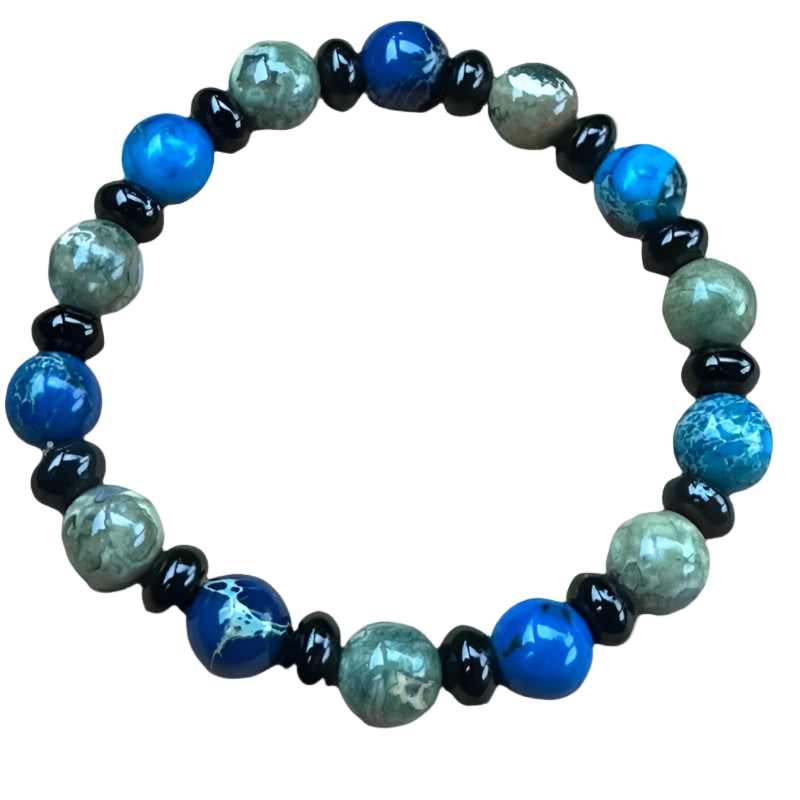 Cancer Bracelet. A beaded bracelet with semi-precious blue, black, and green beads.
