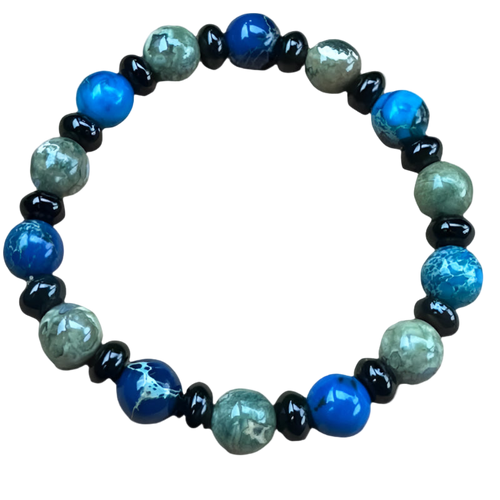Cancer Bracelet. A beaded bracelet with semi-precious blue, black, and green beads.