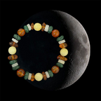 Colorful beaded bracelet on a moon-like surface created and produced by AstroCreations, designers of Zodiac jewelry.